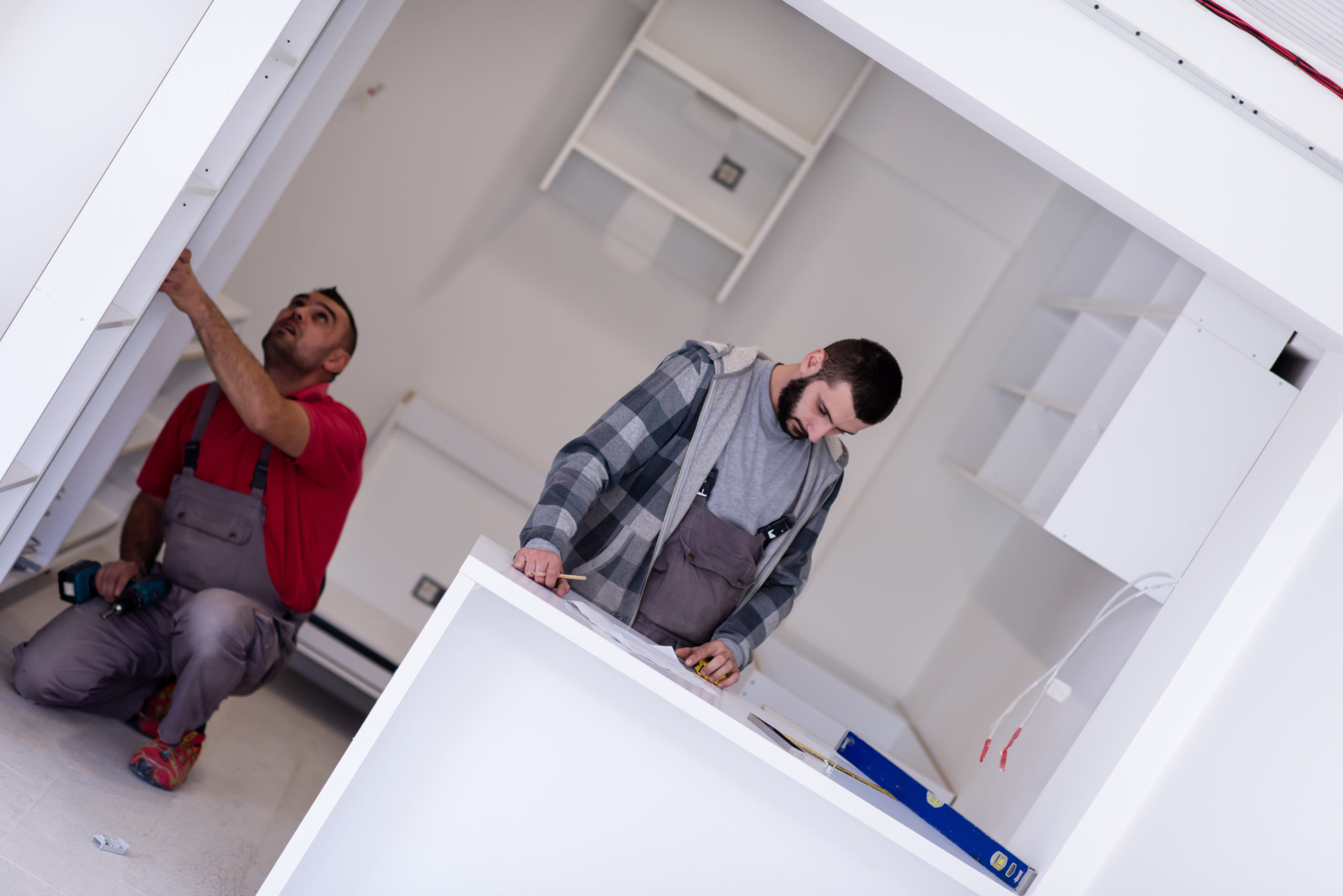 workers installing a new kitchen